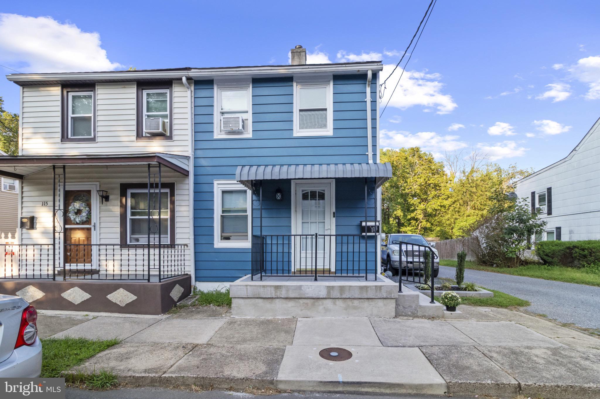 113 Risdon Street Mount Holly, NJ 08060 - Photo 1 of 25 Charming blue duplex with inviting porch.