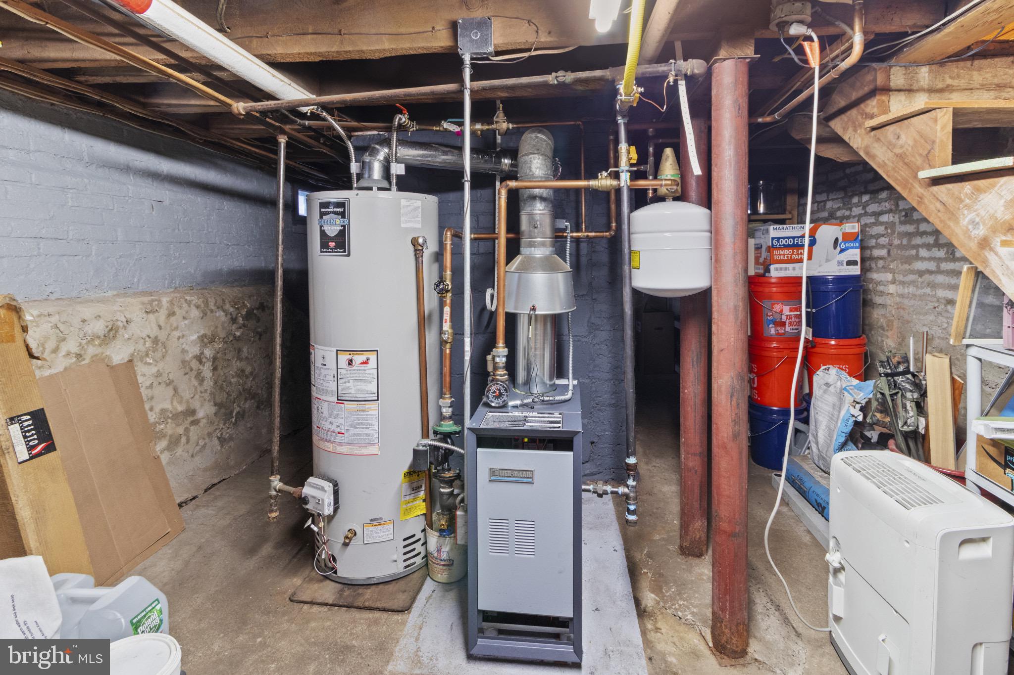113 Risdon Street Mount Holly, NJ 08060 - Photo 19 of 25 Functional basement utility area with appliances.