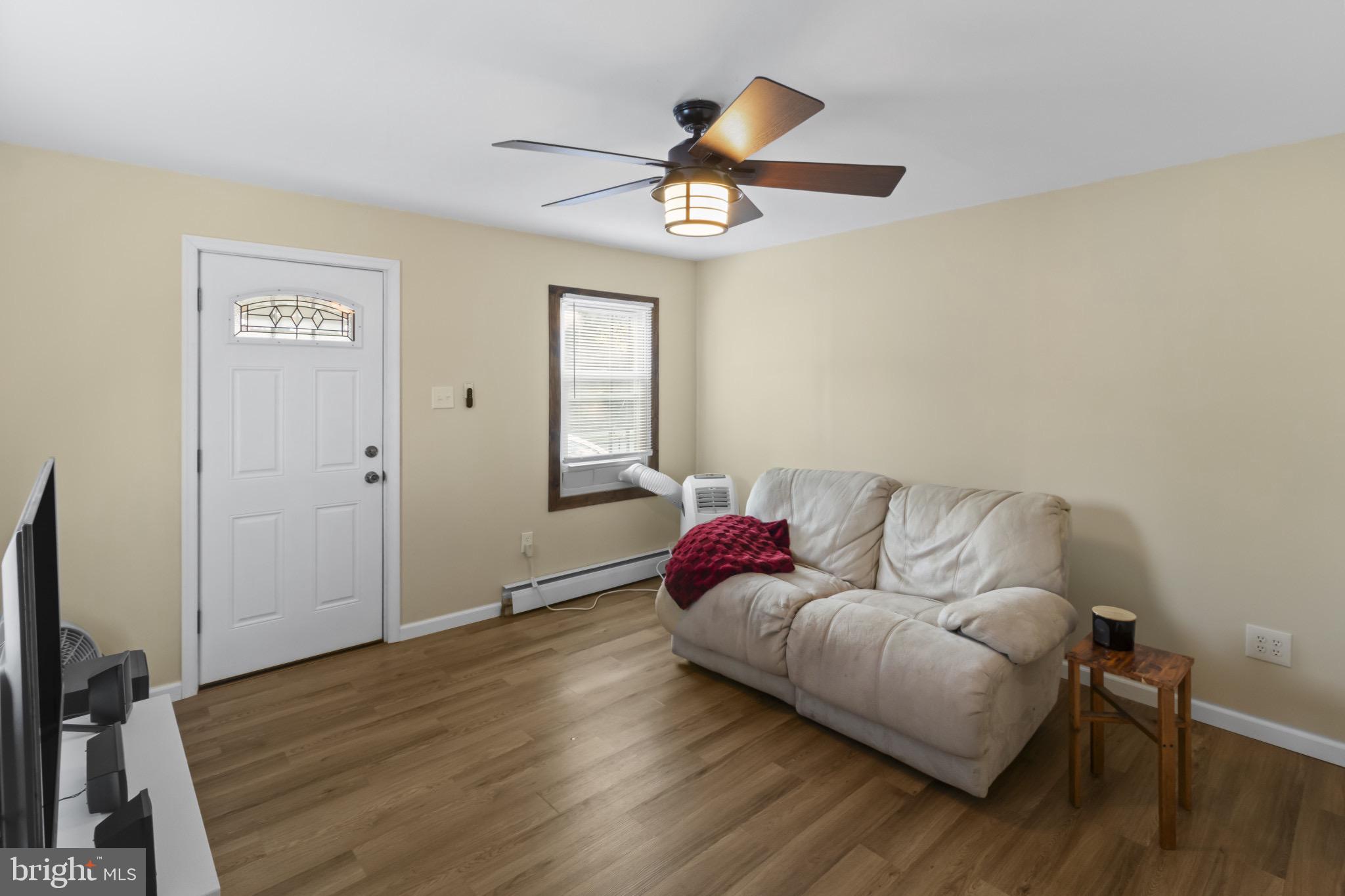113 Risdon Street Mount Holly, NJ 08060 - Photo 3 of 25 Cozy living space with natural light.
