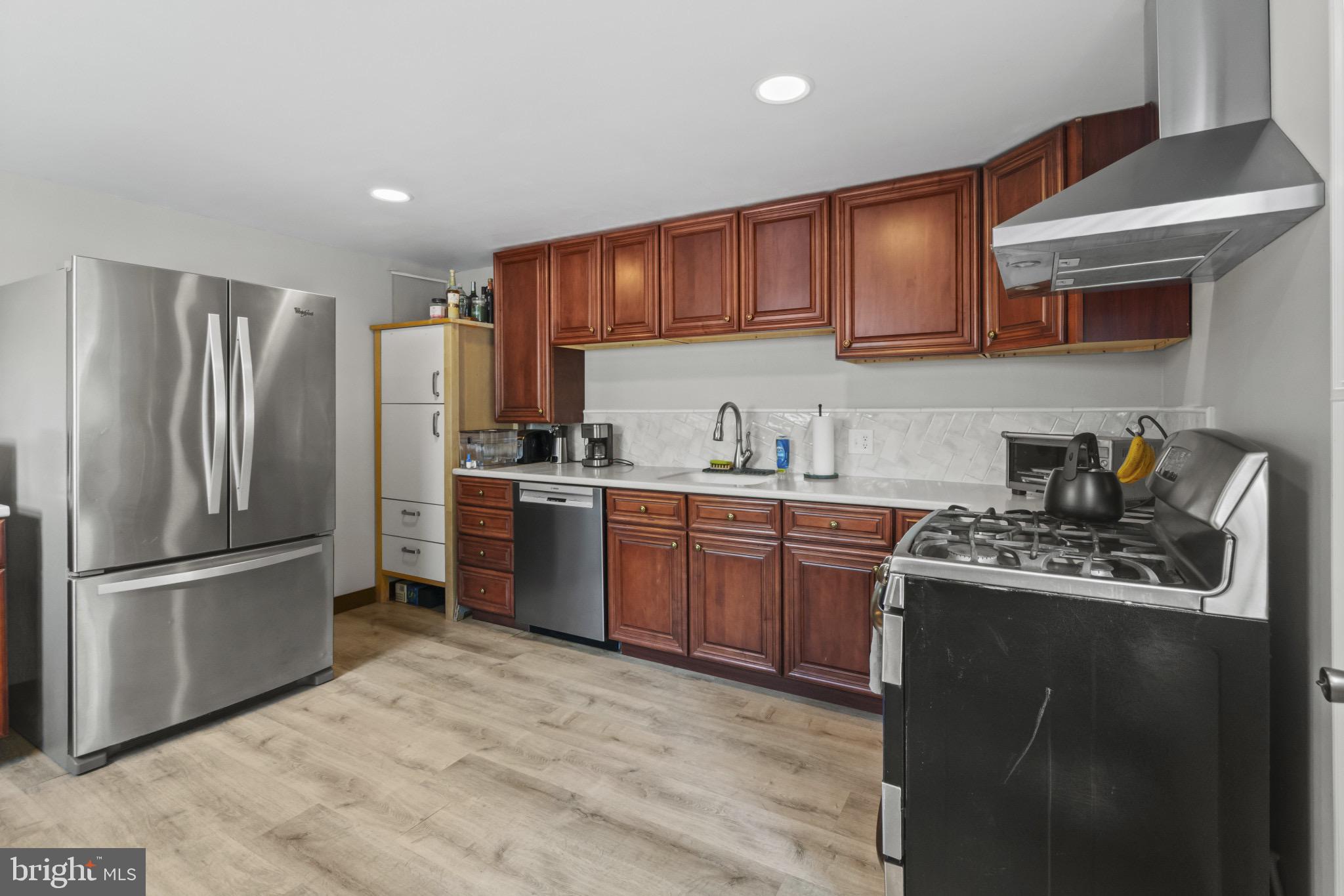 113 Risdon Street Mount Holly, NJ 08060 - Photo 7 of 25 Modern kitchen with sleek appliances.