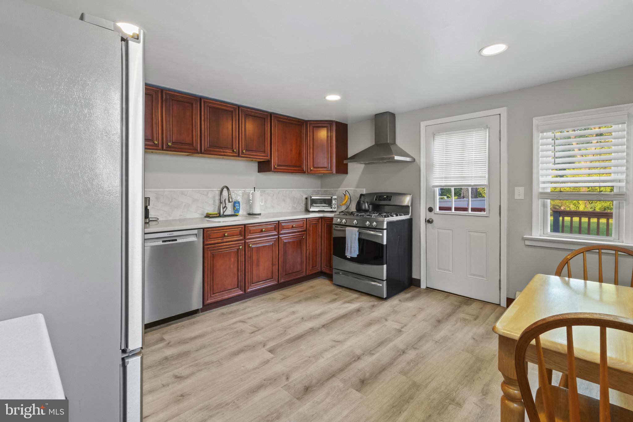 113 Risdon Street Mount Holly, NJ 08060 - Photo 8 of 25 Modern kitchen with warm wood accents.