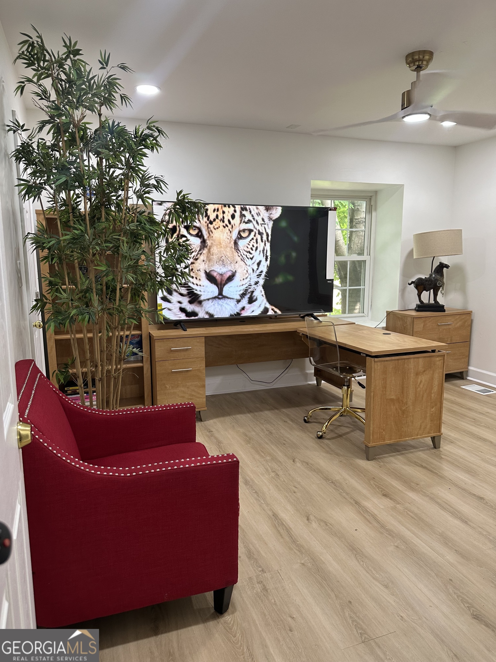 1261 Lavista Road Northeast, Unit N8 Atlanta, GA 30324 - Photo 22 of 29 a living room with furniture and a potted plant