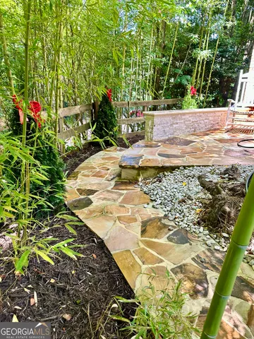 a backyard of a house with lots of green space