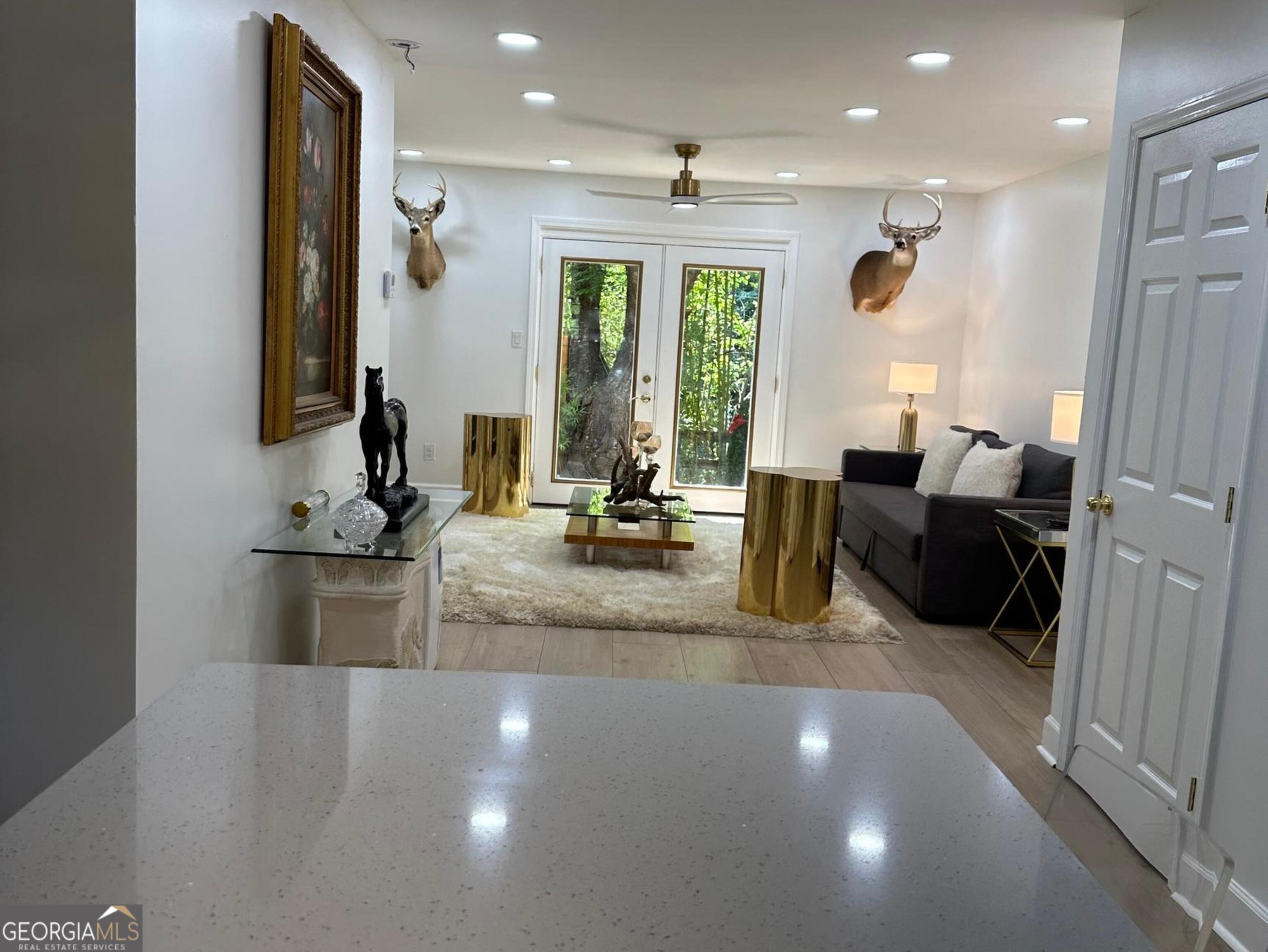 1261 Lavista Road Northeast, Unit N8 Atlanta, GA 30324 - Photo 9 of 29 a view of a living room and a large window