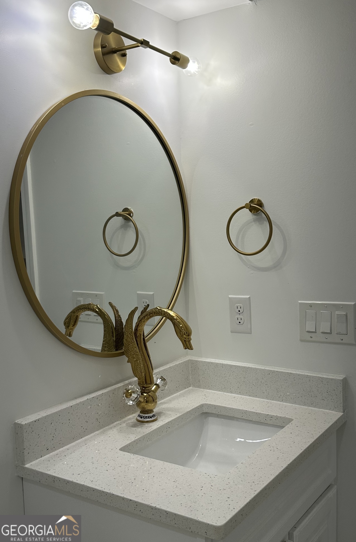1261 Lavista Road Northeast, Unit N8 Atlanta, GA 30324 - Photo 10 of 29 a bathroom with a sink and mirror