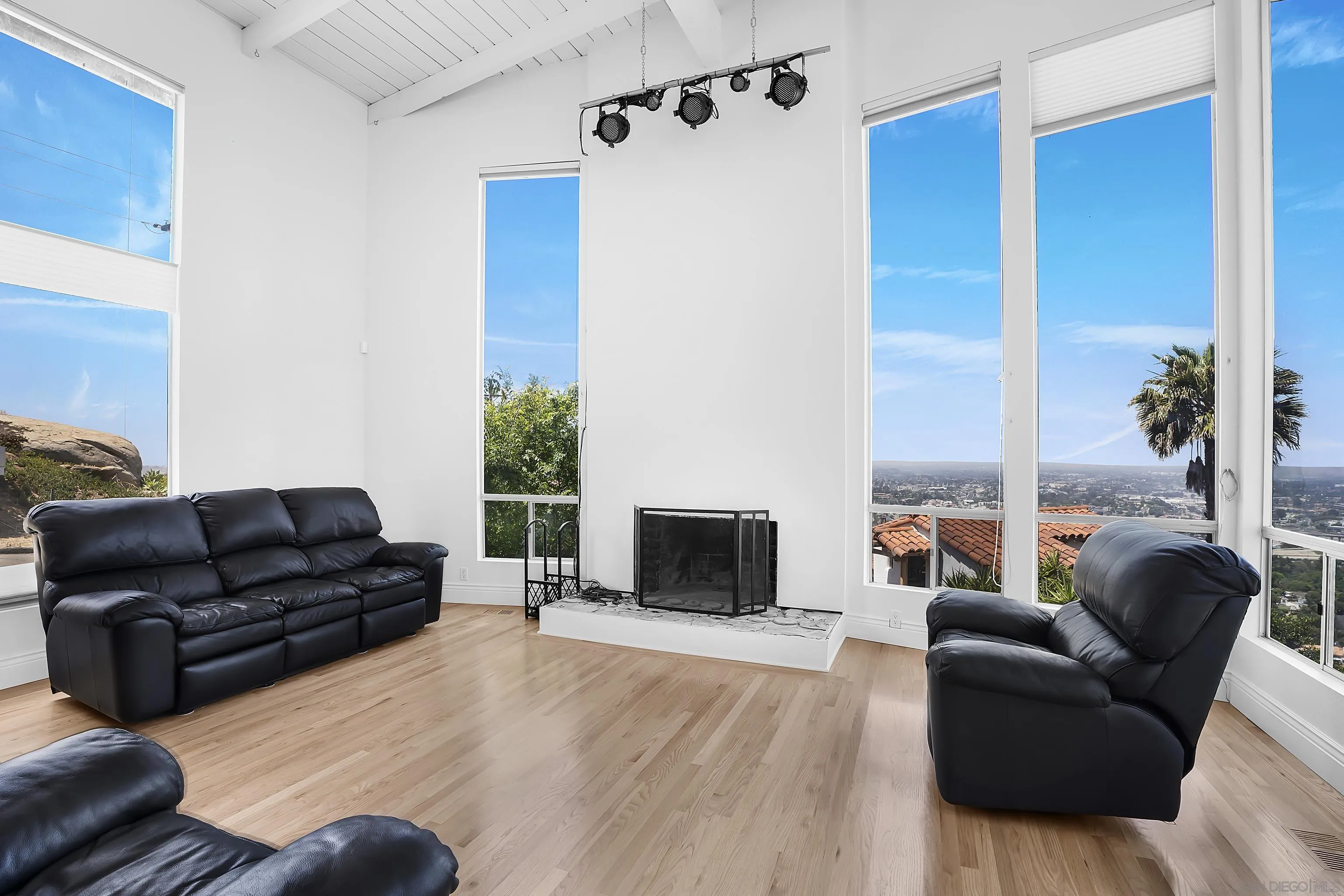 9612 Summit Circle La Mesa, CA 91941 - Photo 7 of 35 a living room with furniture and a fireplace