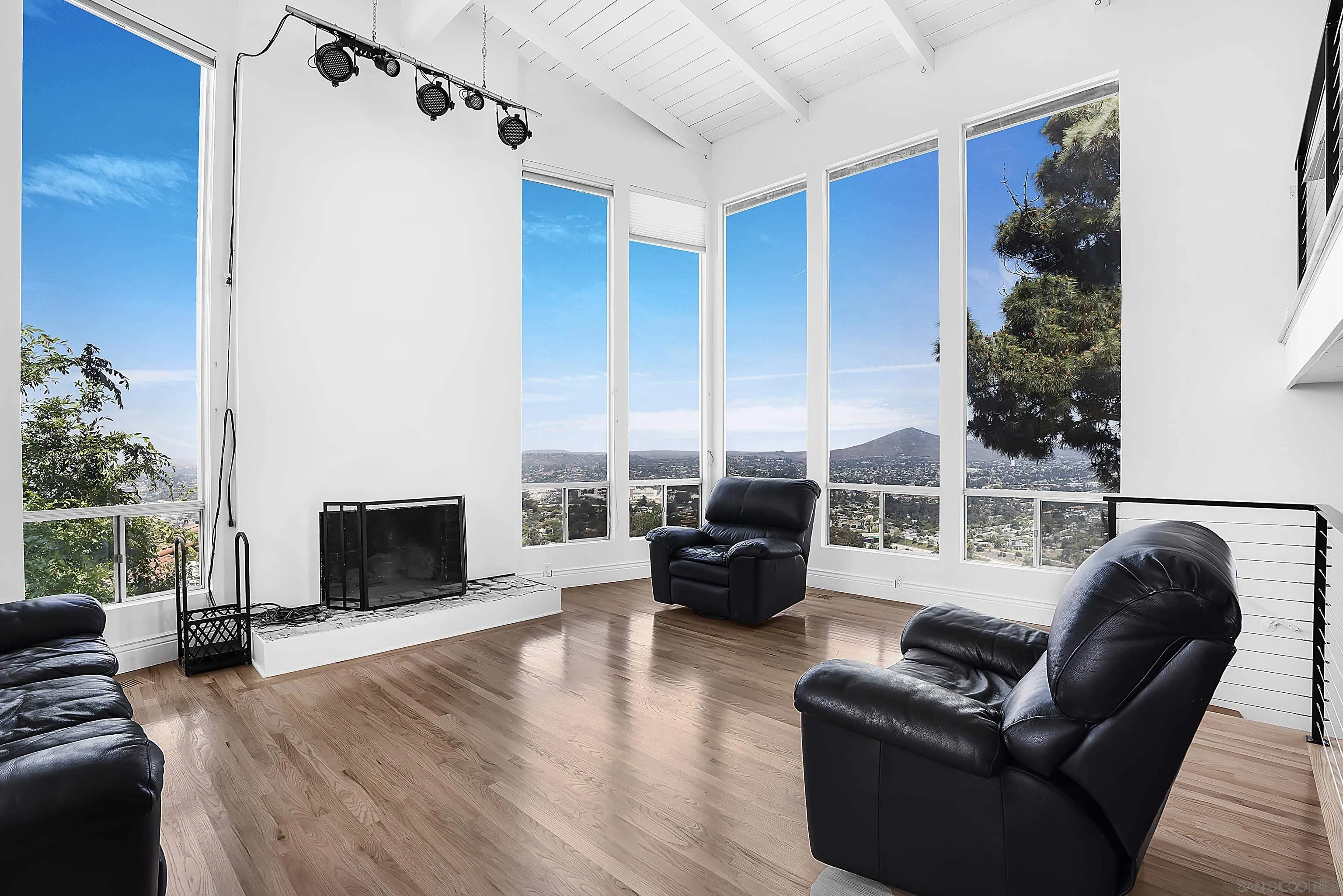 9612 Summit Circle La Mesa, CA 91941 - Photo 8 of 35 a living room with furniture fireplace and flat screen tv