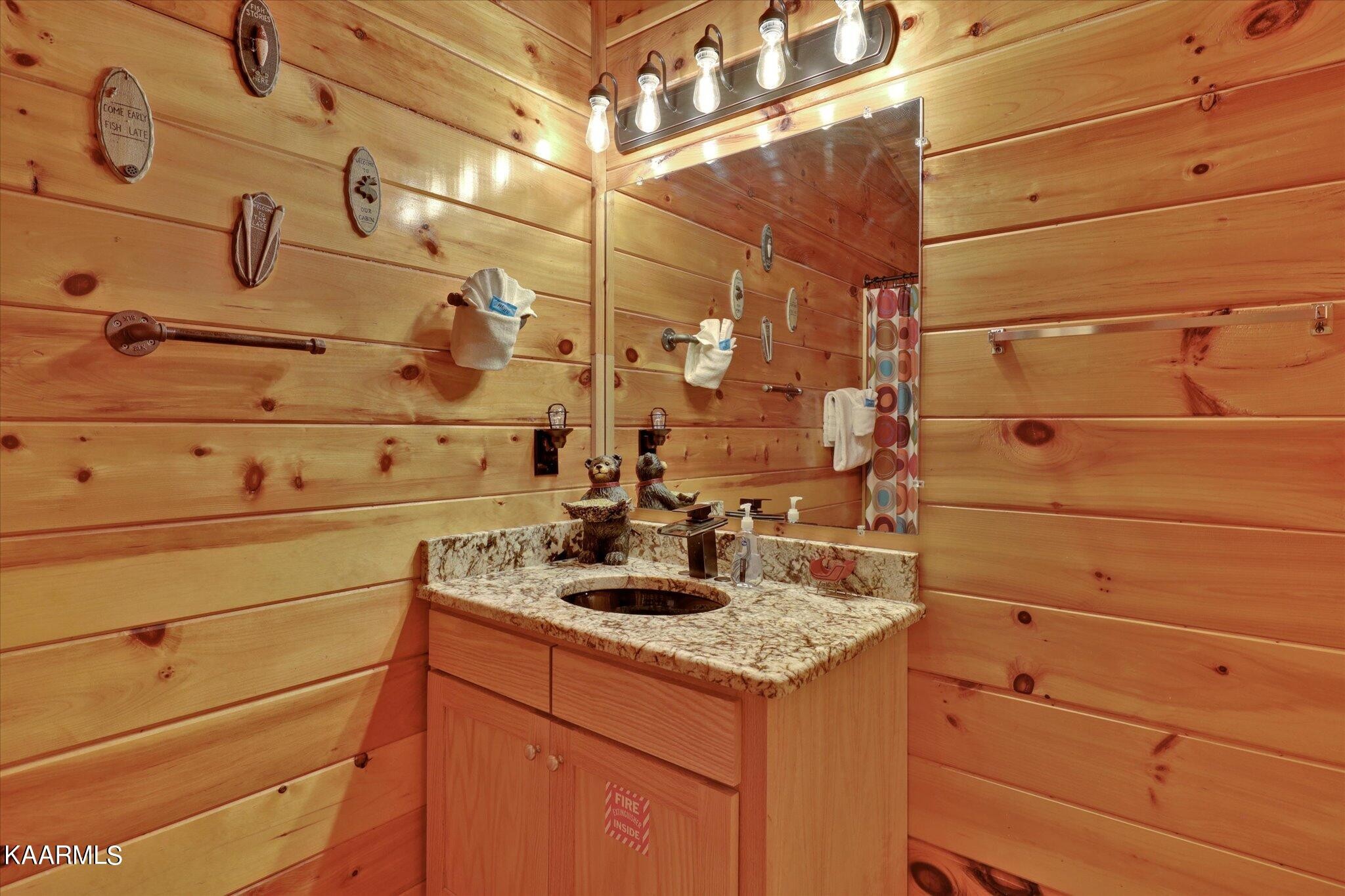 522 Blackberry Rdg Way Sevierville, TN 37863 - Photo 31 of 48 a bathroom with a sink and vanity
