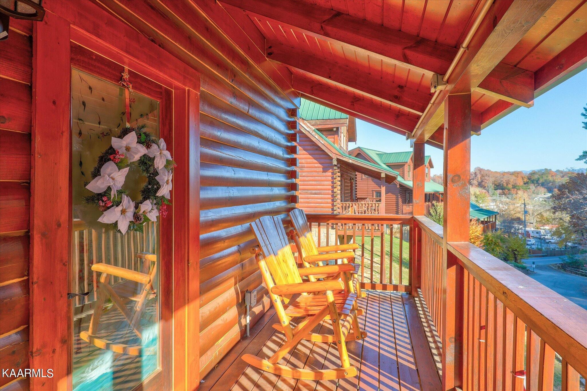 522 Blackberry Rdg Way Sevierville, TN 37863 - Photo 36 of 48 a view of a balcony with wooden floor and stairs