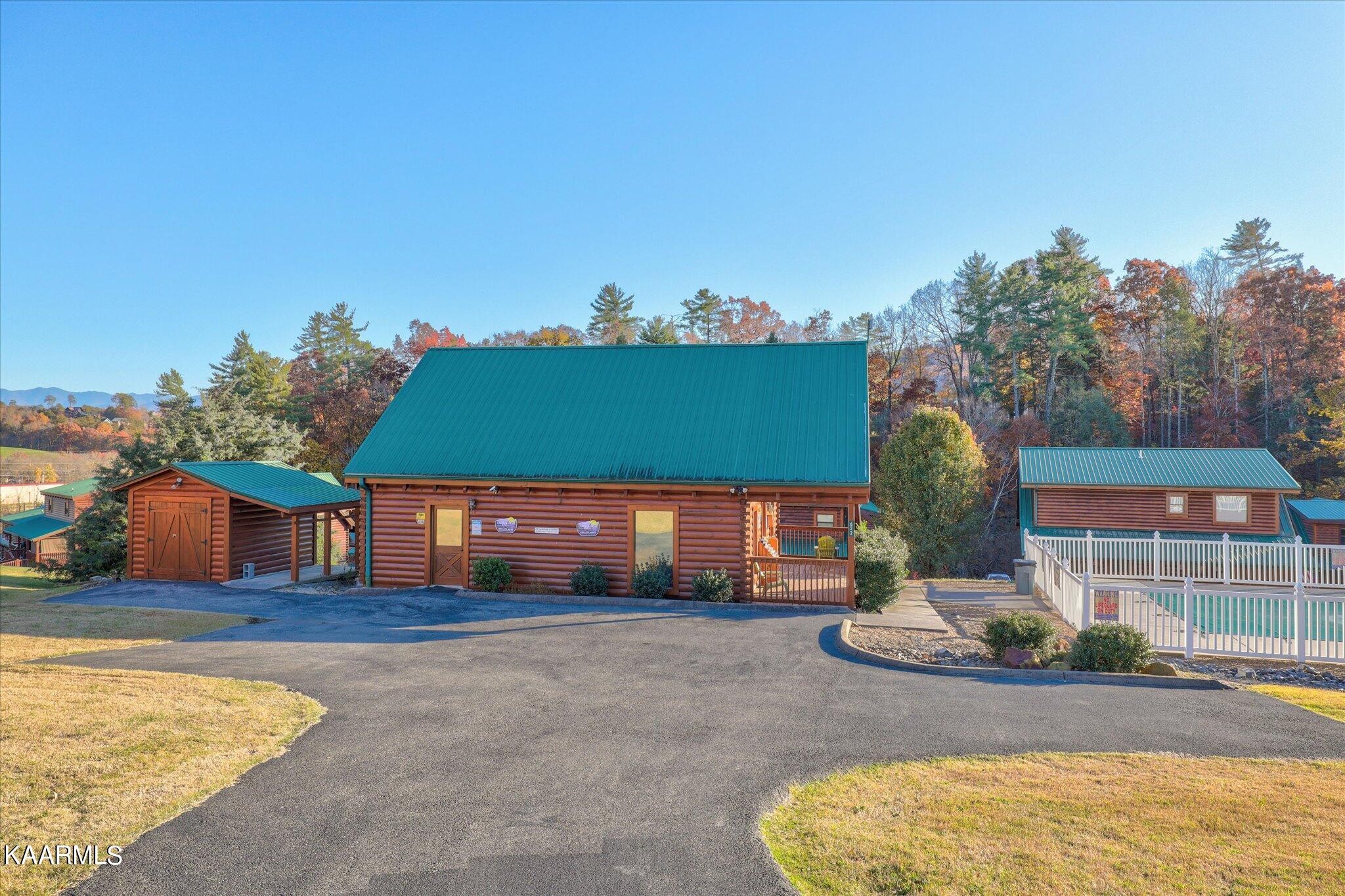 522 Blackberry Rdg Way Sevierville, TN 37863 - Photo 39 of 48 a front view of a house with a yard