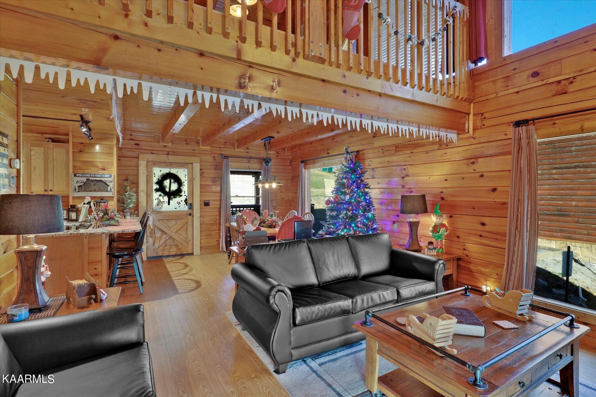 522 Blackberry Rdg Way Sevierville, TN 37863 - Photo 4 of 48 a living room with furniture and a fireplace
