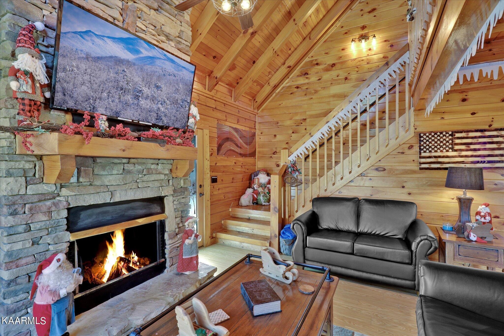 522 Blackberry Rdg Way Sevierville, TN 37863 - Photo 6 of 48 a living room with furniture and a fireplace
