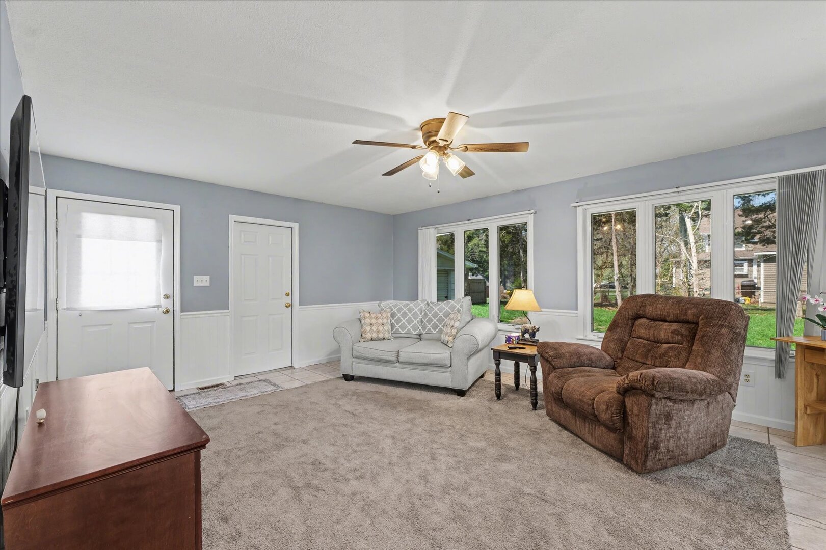 248 East Fremont Street Bement, IL 61813 - Photo 12 of 40 a living room with furniture and a large window