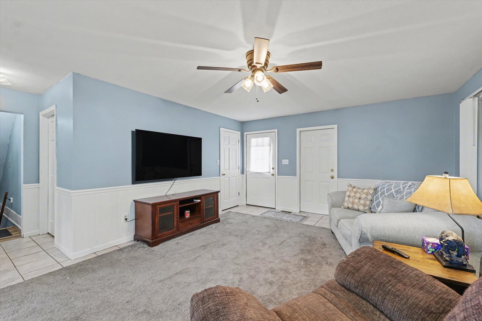 248 East Fremont Street Bement, IL 61813 - Photo 13 of 40 a living room with furniture and a flat screen tv