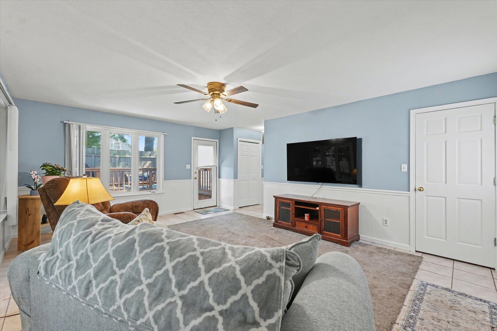 248 East Fremont Street Bement, IL 61813 - Photo 14 of 40 a spacious bedroom with a bed and a flat screen tv