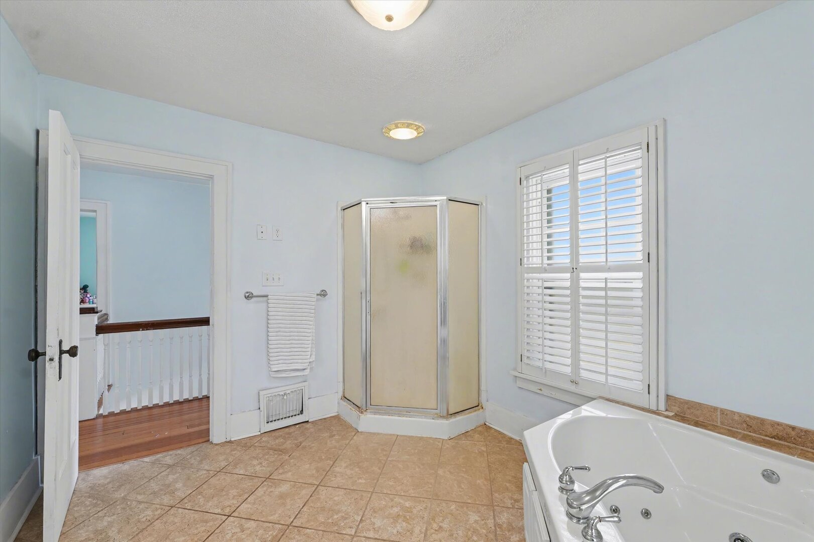 248 East Fremont Street Bement, IL 61813 - Photo 24 of 40 a view of a bathroom with tub and shower