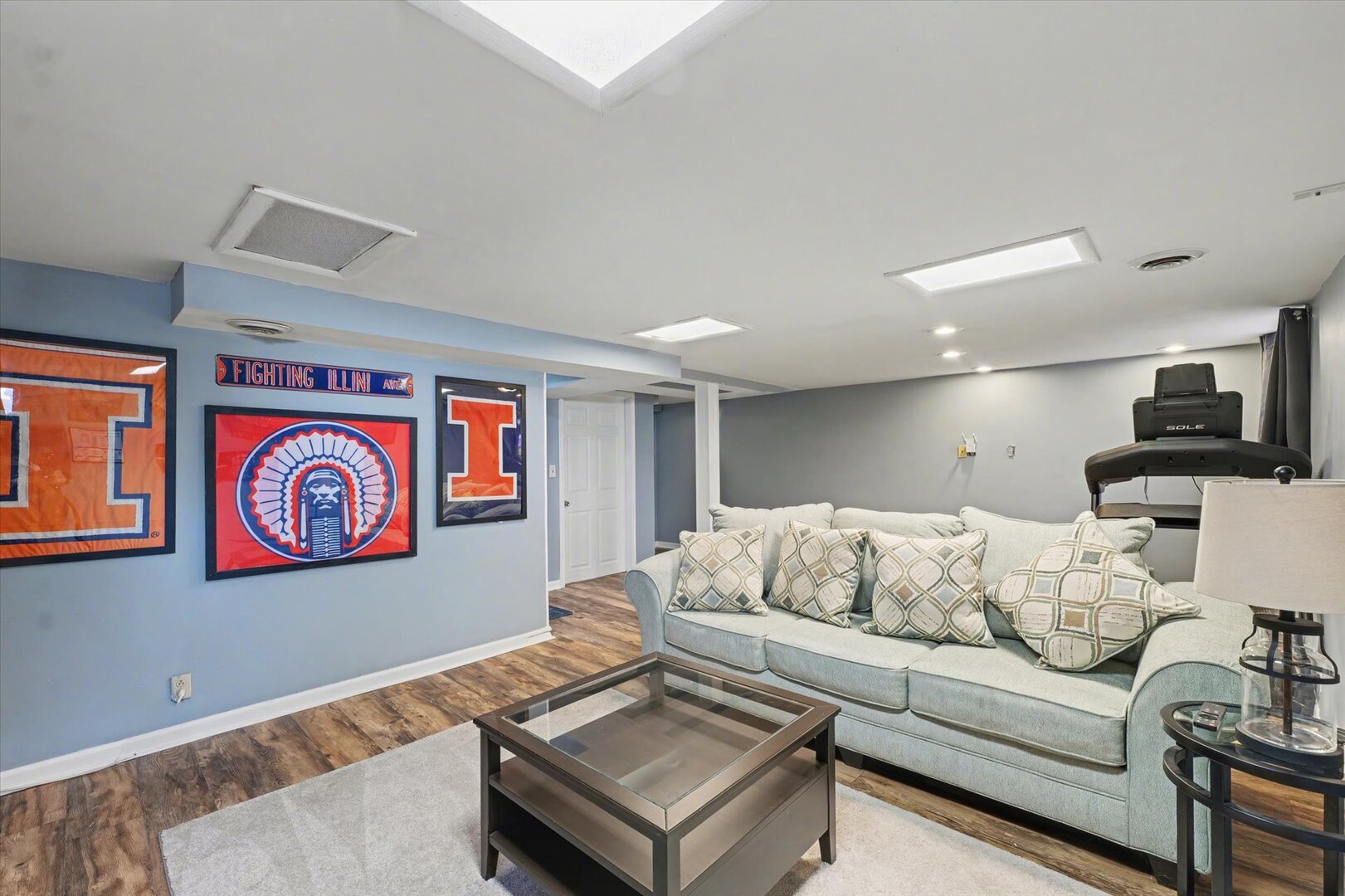 248 East Fremont Street Bement, IL 61813 - Photo 28 of 40 a living room with furniture and wall paintings