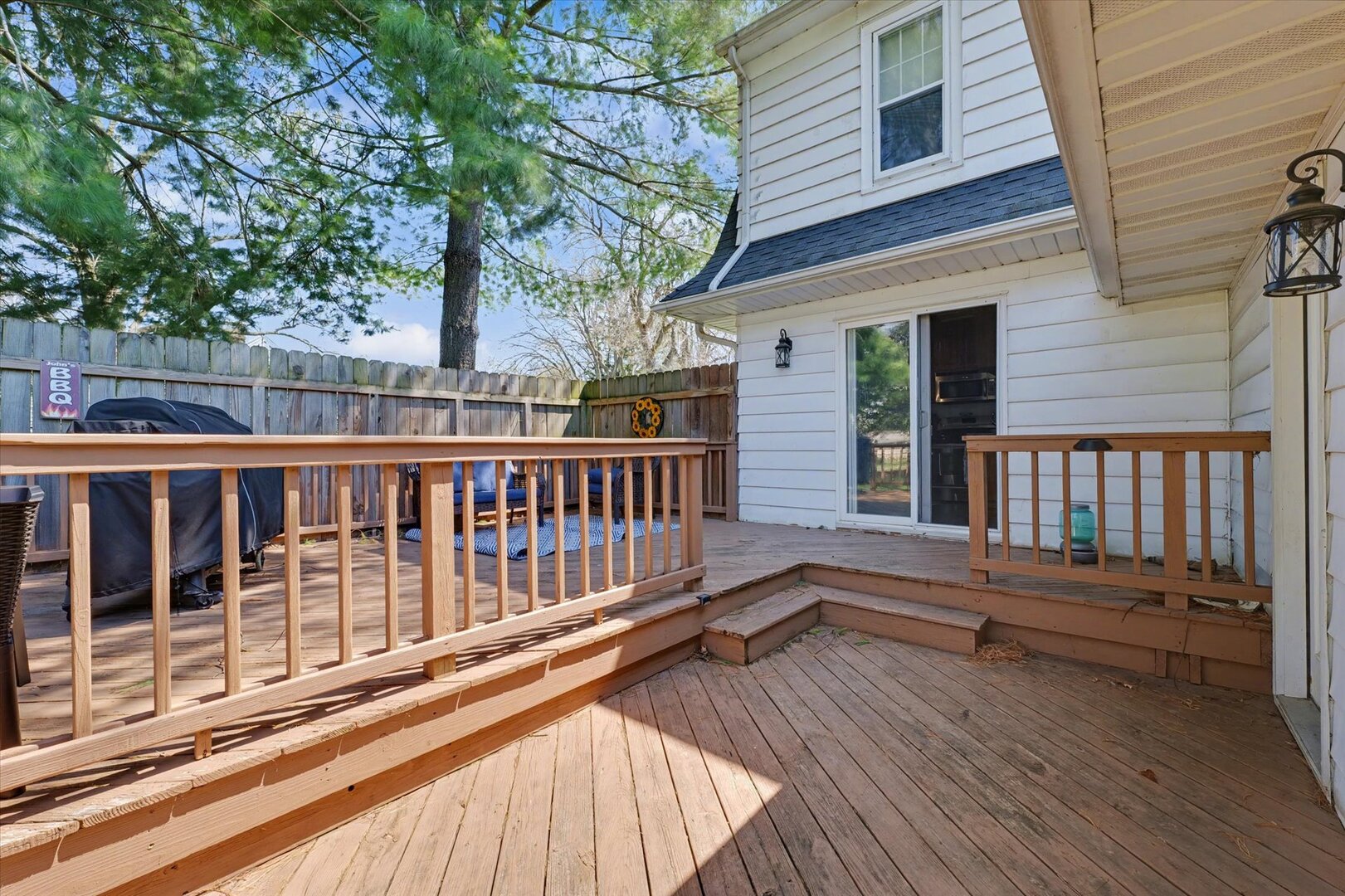 248 East Fremont Street Bement, IL 61813 - Photo 33 of 40 a view of a roof deck with wooden floor and fence