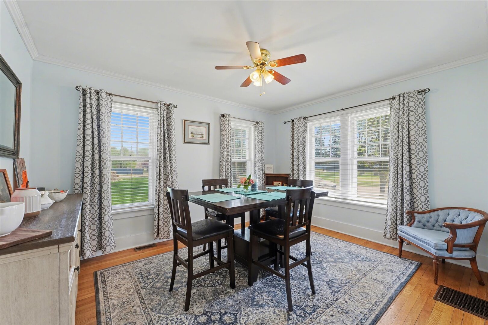 248 East Fremont Street Bement, IL 61813 - Photo 7 of 40 a view of a dining room with furniture window and wooden floor