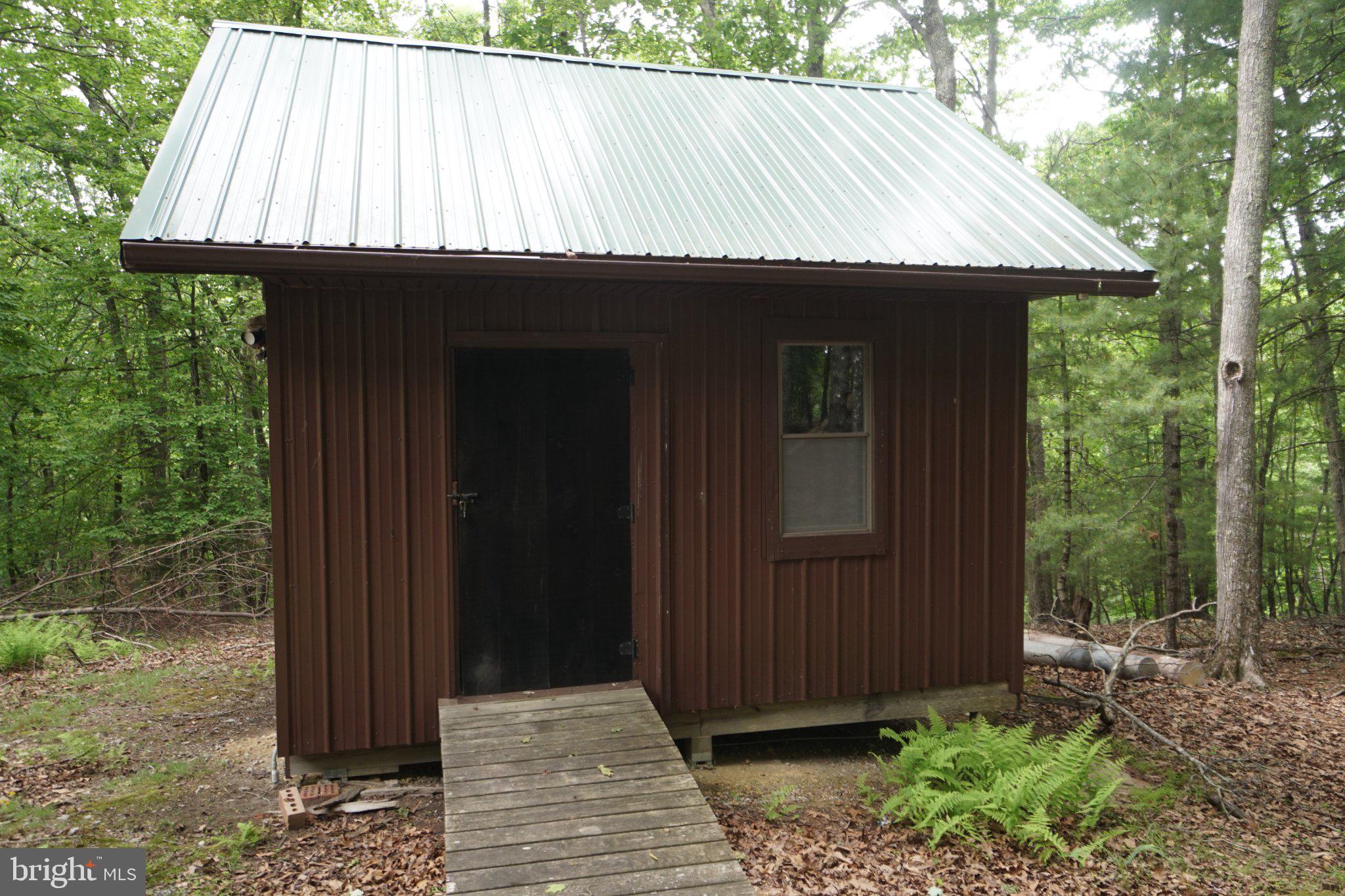 150 Sharp Ridge Lane Franklin, WV 26807 - Photo 8 of 69 Charming cabin nestled in the woods.