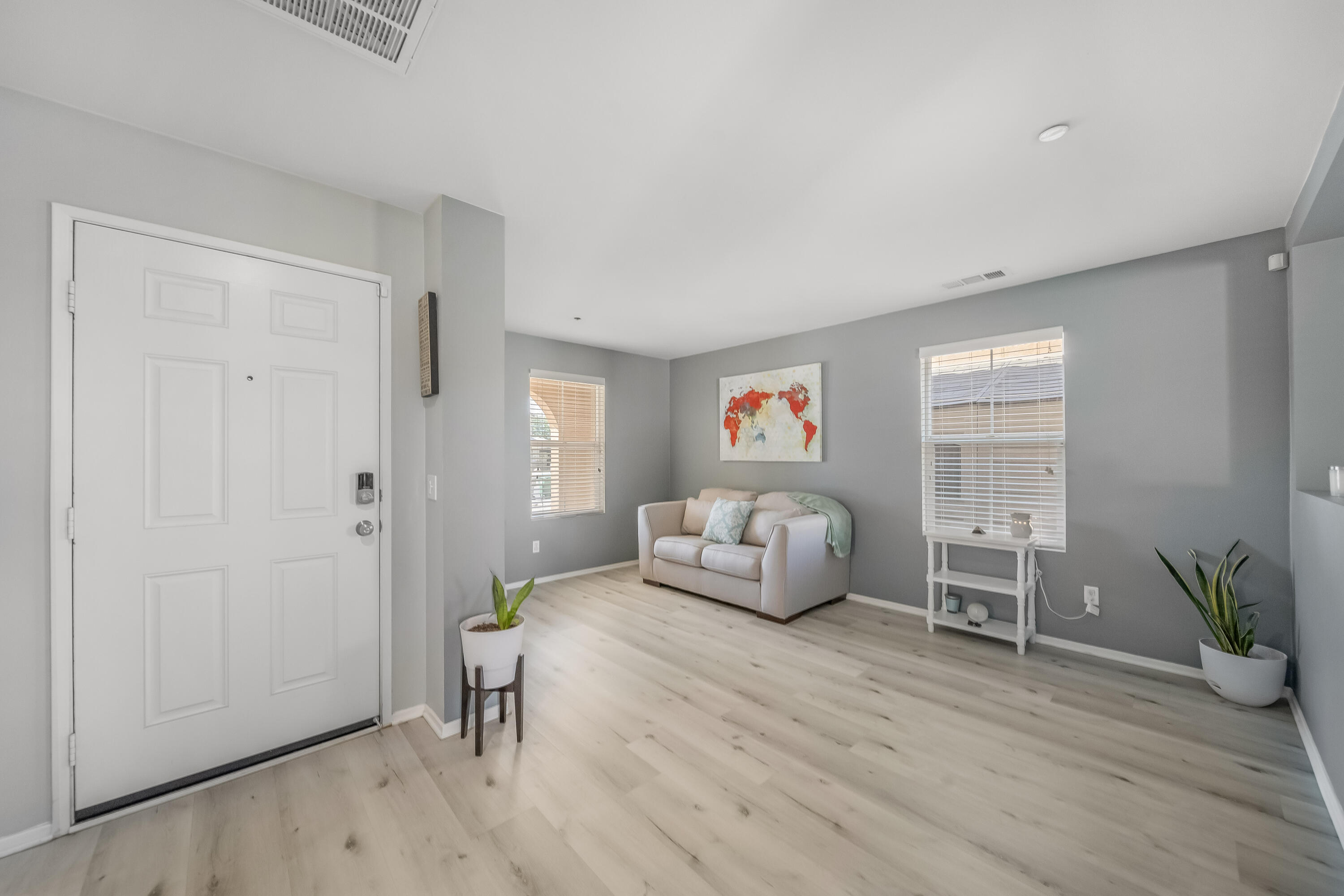84030 Manhattan Avenue Coachella, CA 92236 - Photo 15 of 74 a living room with furniture and a wooden floor