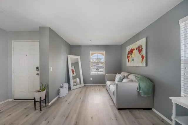 a kitchen with a sink cabinets and window