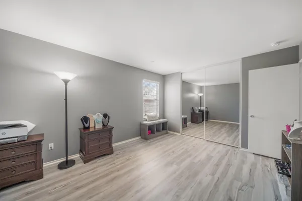 a kitchen with a sink cabinets and window