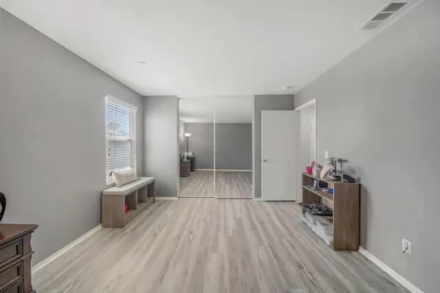 a bathroom with a sink a vanity and a mirror
