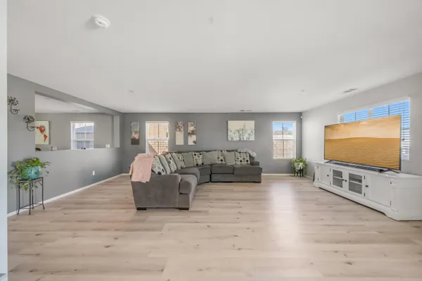 a living room with furniture and a couch