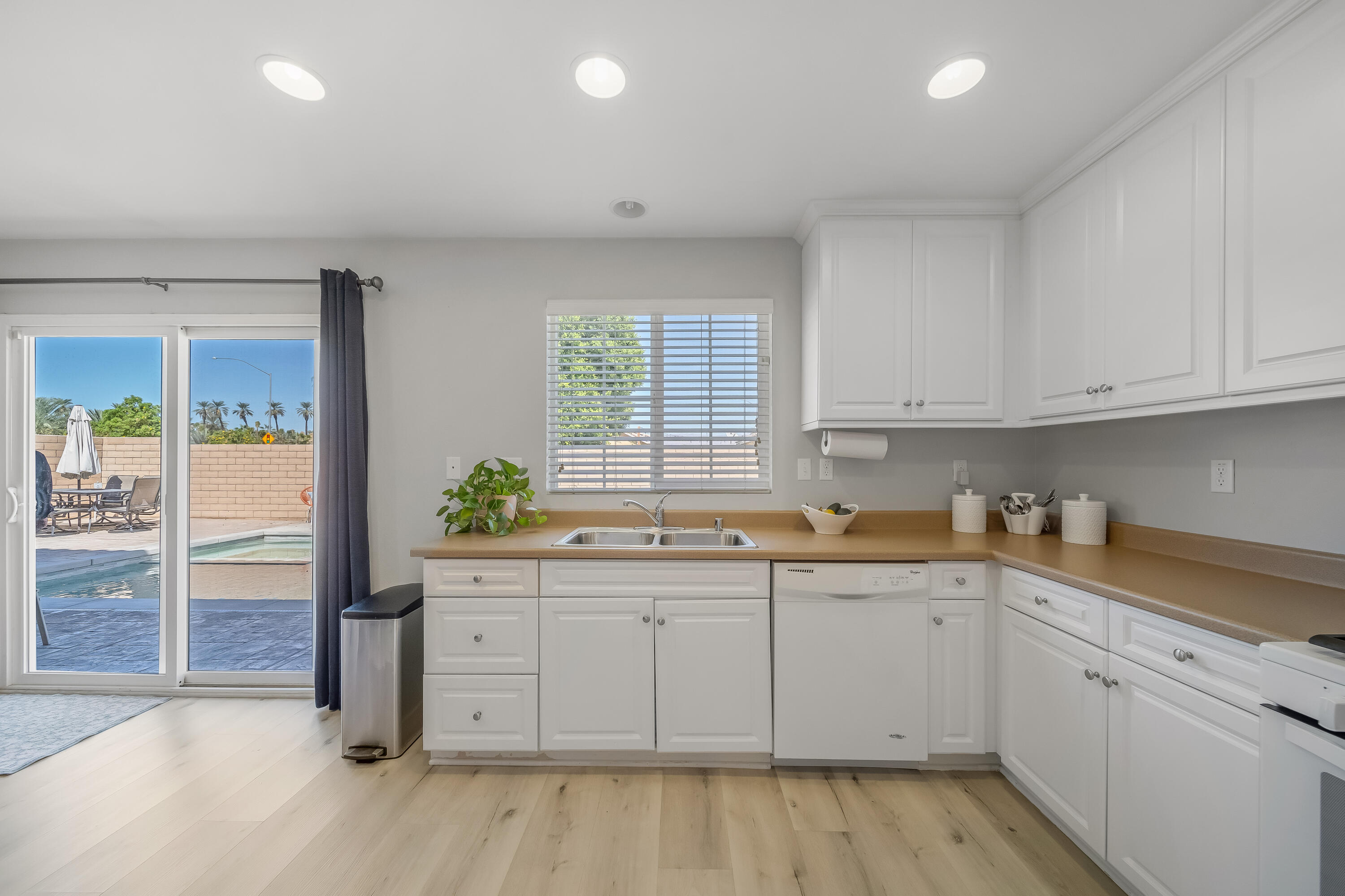 84030 Manhattan Avenue Coachella, CA 92236 - Photo 30 of 74 a kitchen with a sink cabinets and window