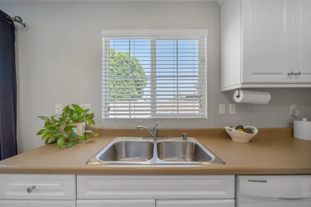 a front view of a house with a garage and a garage