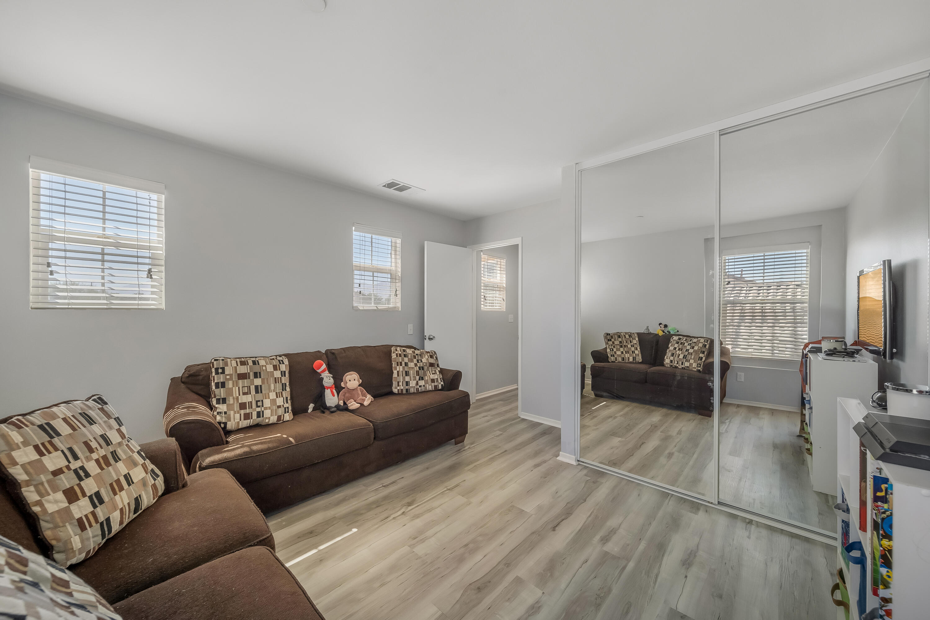 84030 Manhattan Avenue Coachella, CA 92236 - Photo 33 of 74 a living room with furniture and a couch