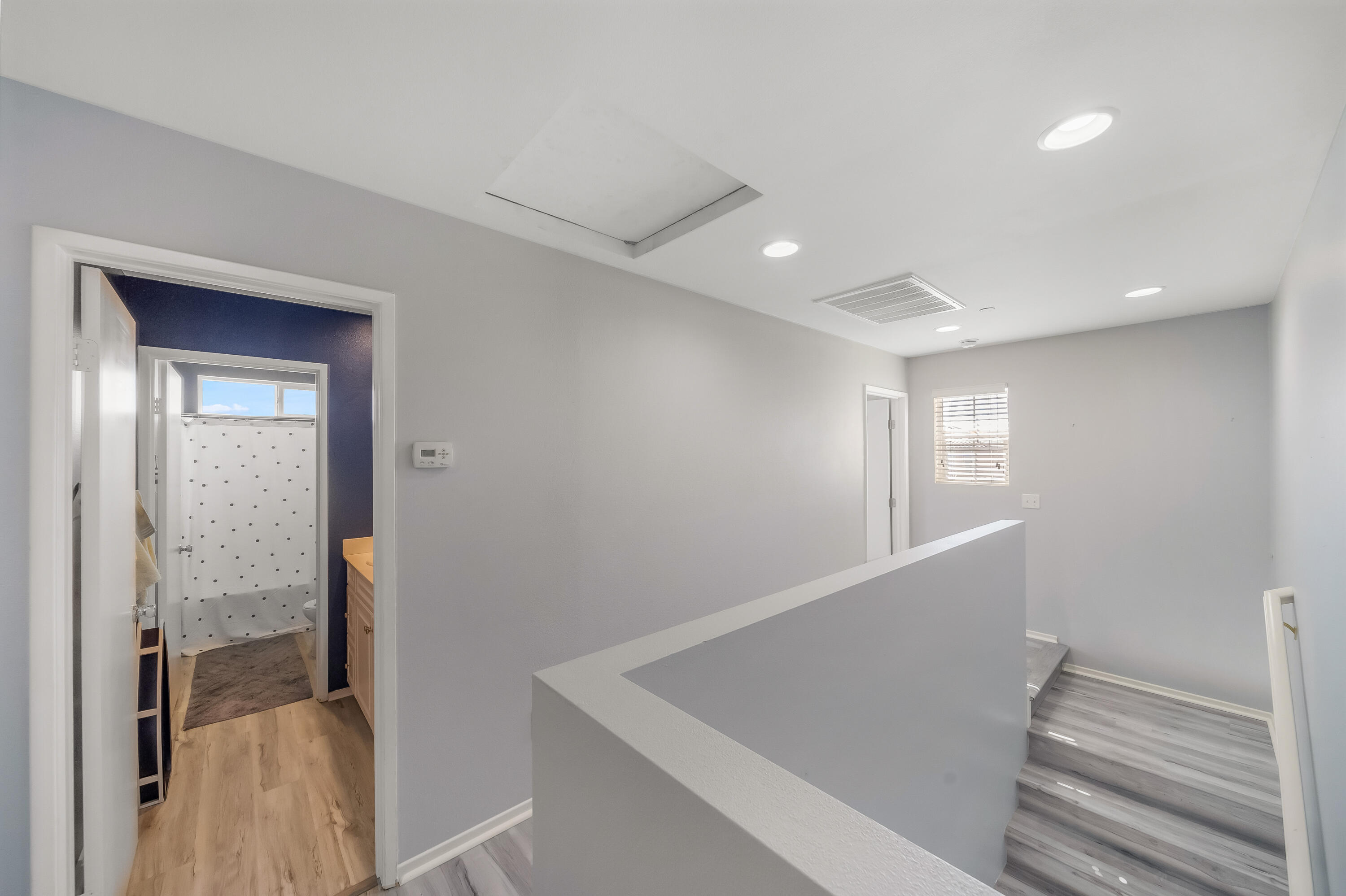 84030 Manhattan Avenue Coachella, CA 92236 - Photo 36 of 74 a view of hallway with stairs and wooden floor