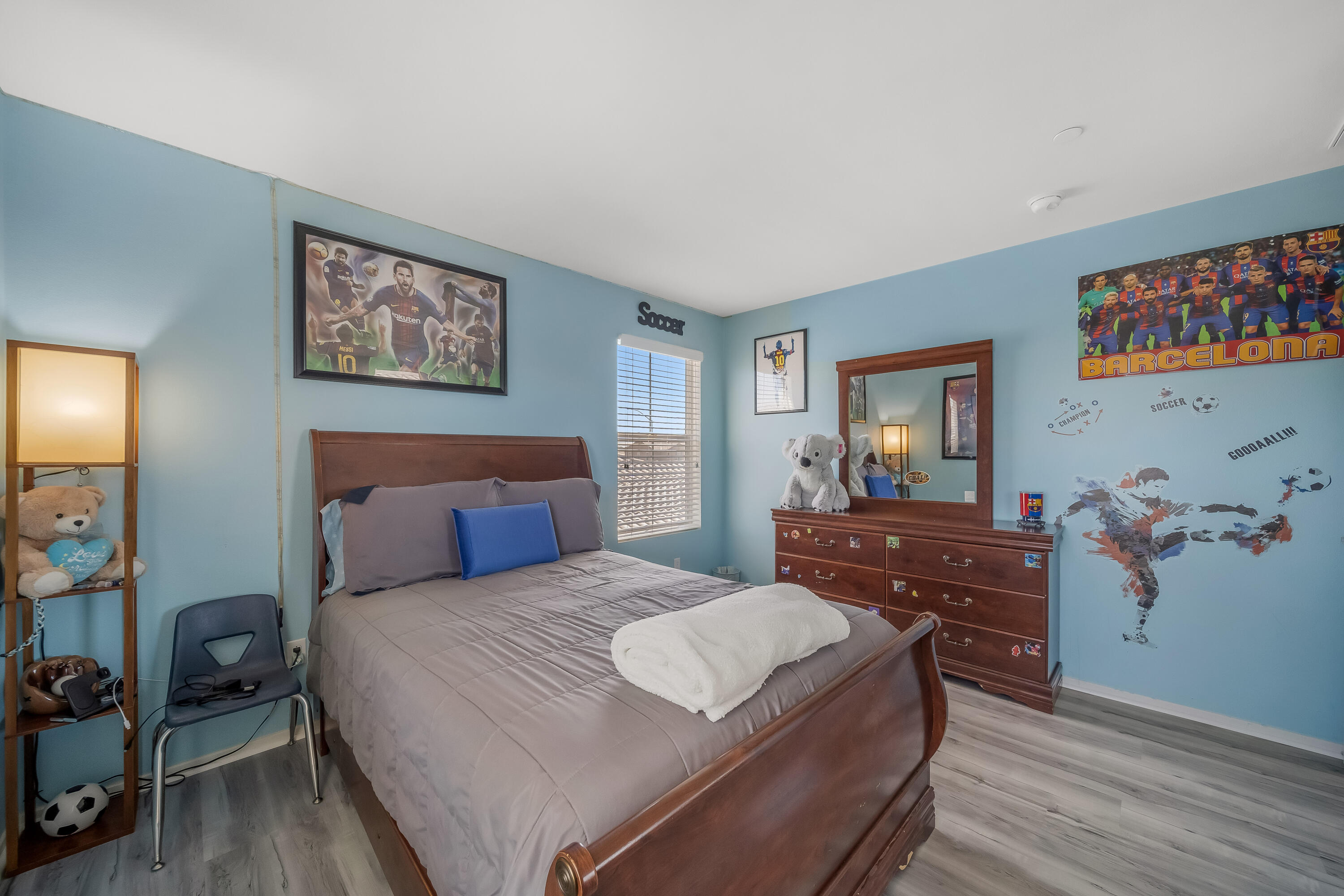 84030 Manhattan Avenue Coachella, CA 92236 - Photo 39 of 74 a bedroom with a bed and a dresser in it