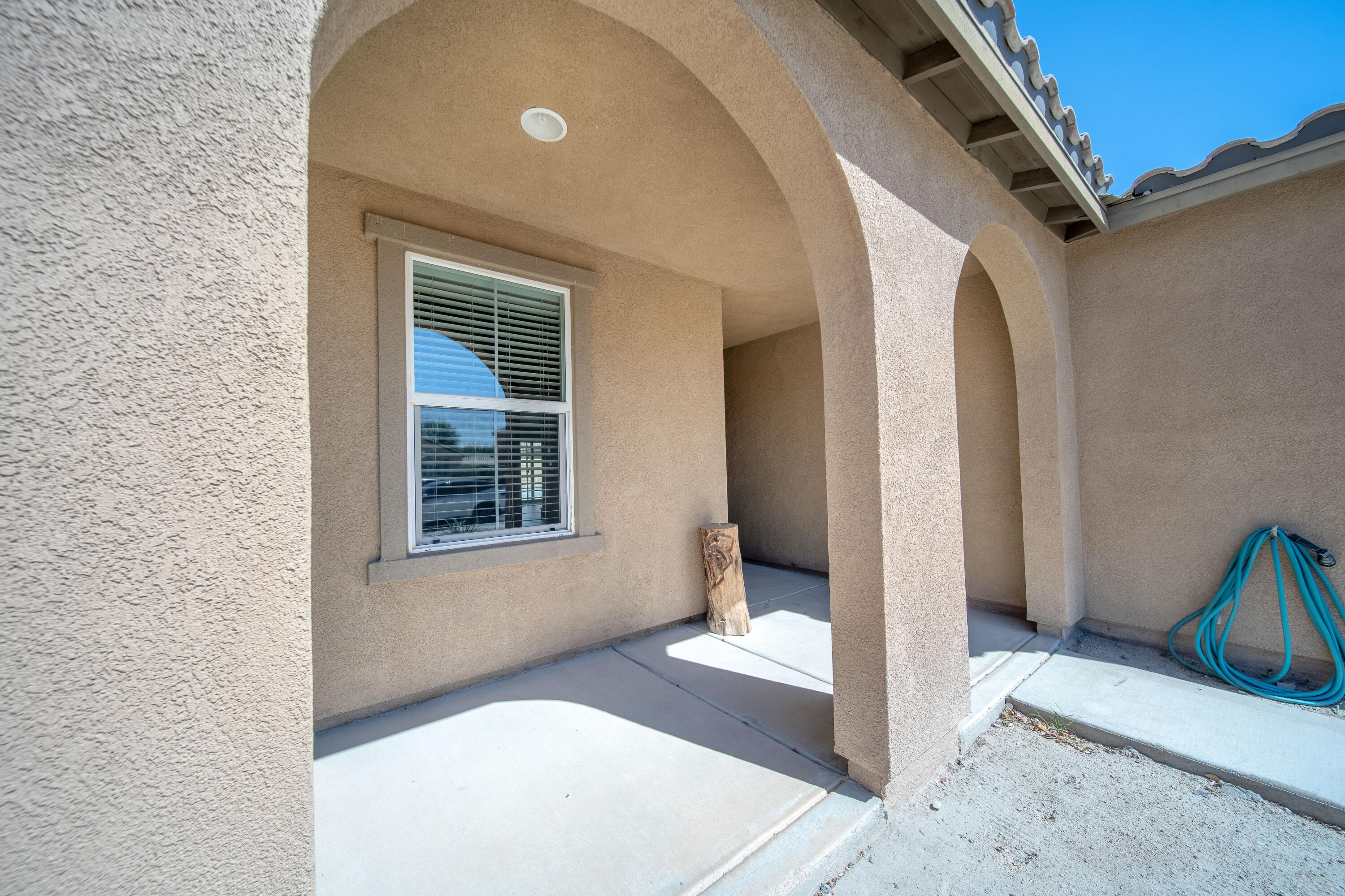 84030 Manhattan Avenue Coachella, CA 92236 - Photo 69 of 74 a view of livingroom with furniture and window