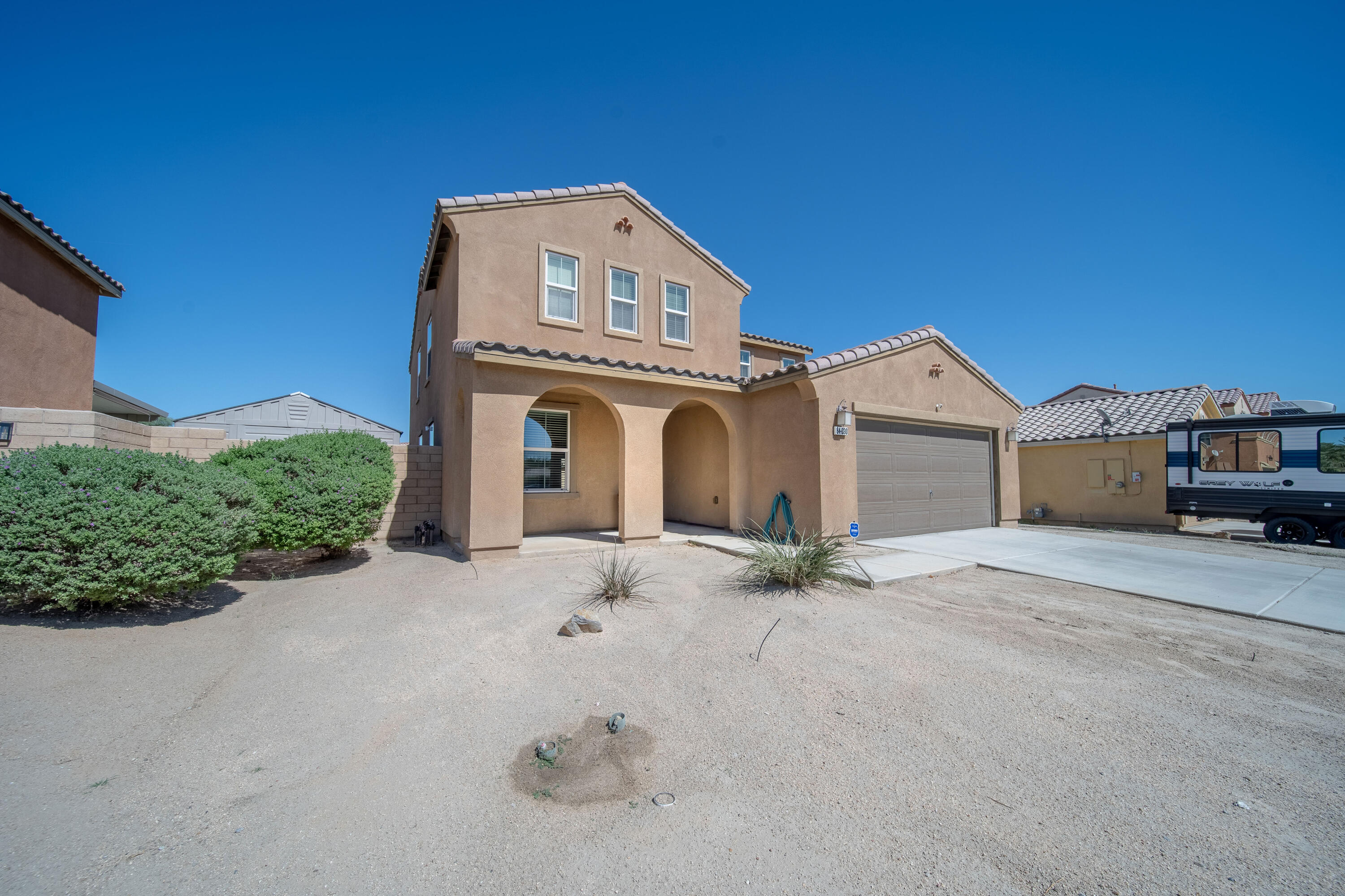 84030 Manhattan Avenue Coachella, CA 92236 - Photo 70 of 74 a front view of a house with a yard
