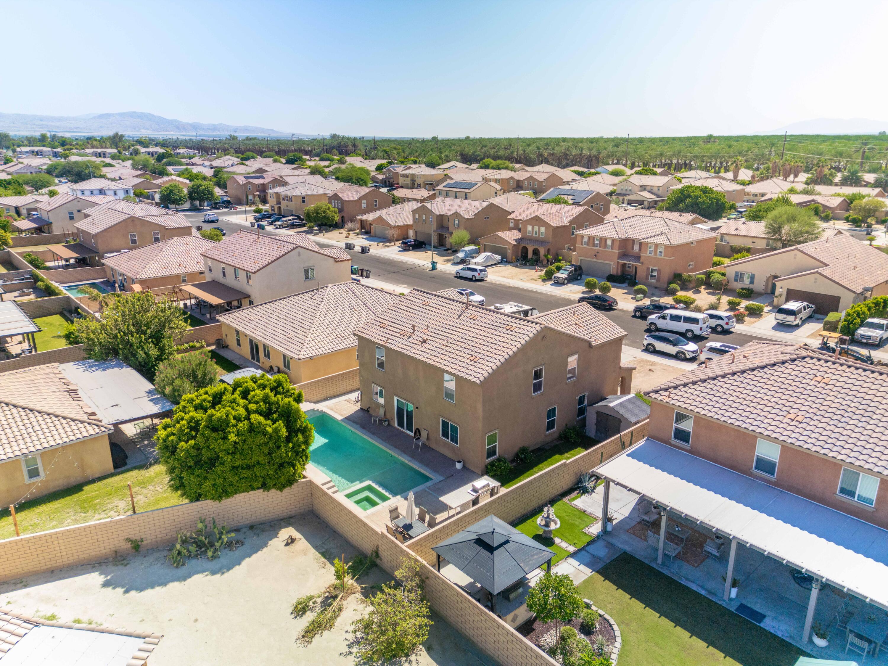 84030 Manhattan Avenue Coachella, CA 92236 - Photo 10 of 74 an aerial view of a city with lots of residential buildings
