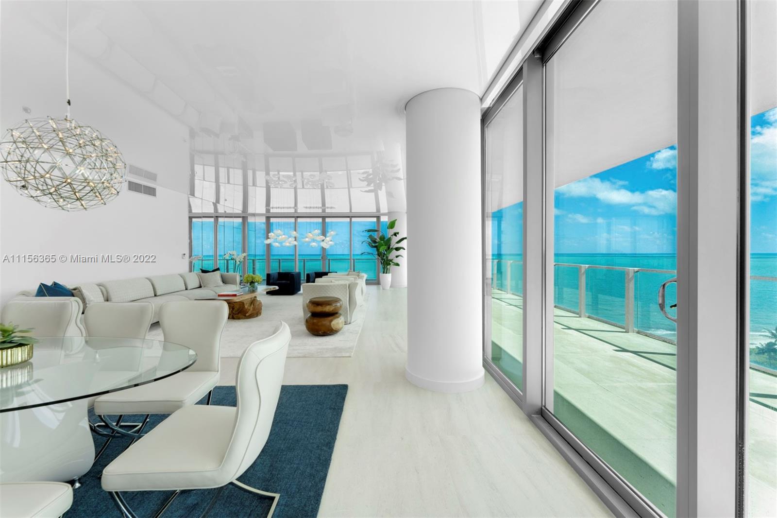 360 Ocean Drive, Unit 1101S Key Biscayne, FL 33149 - Photo 13 of 65 a living room with furniture and a large window