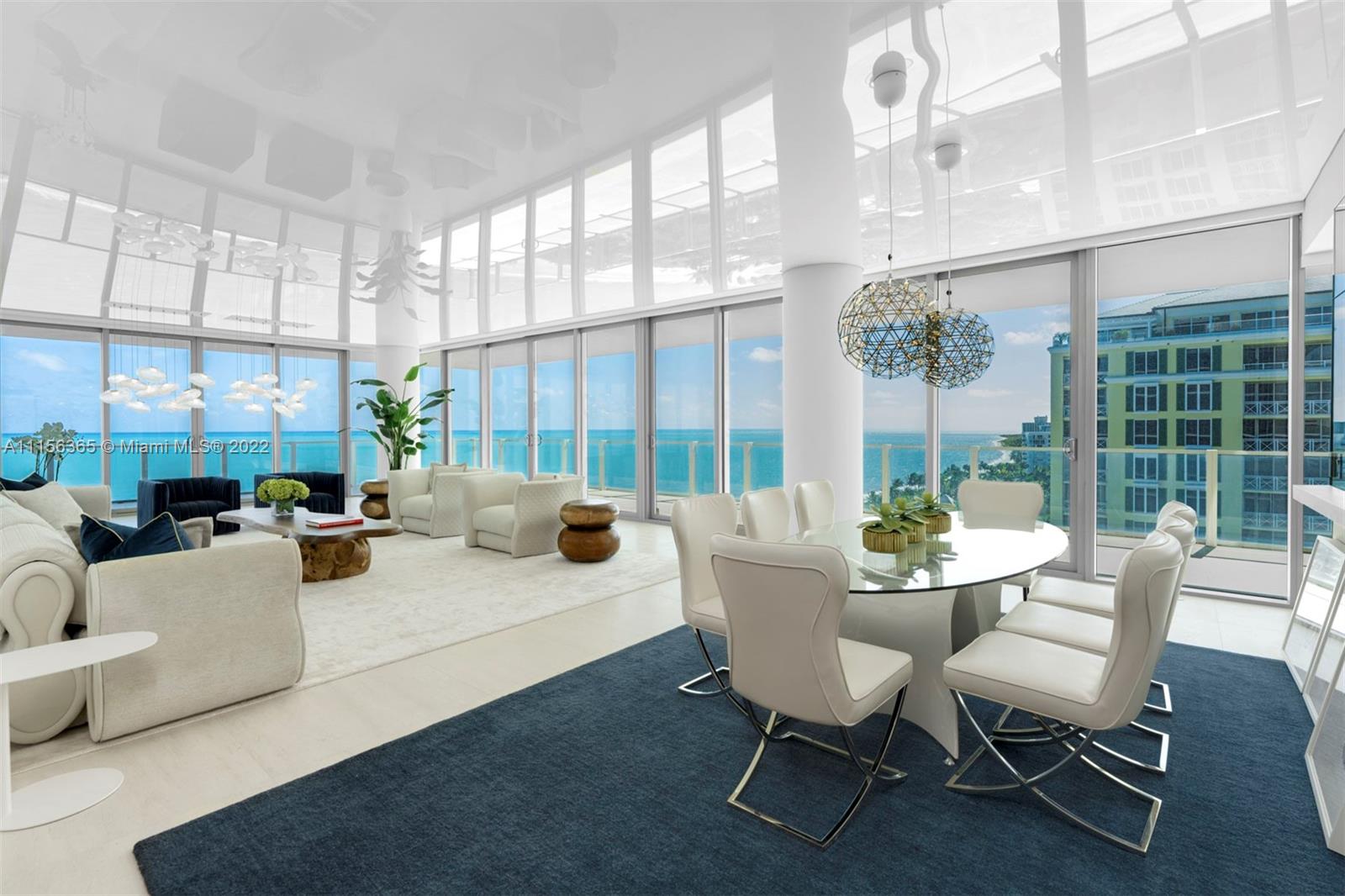 360 Ocean Drive, Unit 1101S Key Biscayne, FL 33149 - Photo 14 of 65 a living room with furniture and a large window
