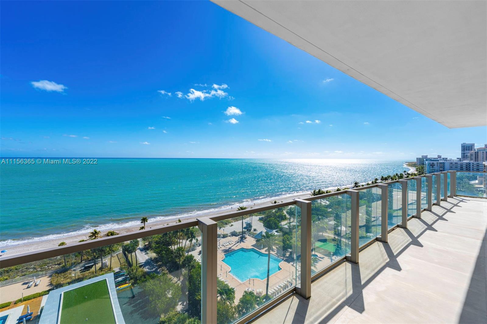 360 Ocean Drive, Unit 1101S Key Biscayne, FL 33149 - Photo 3 of 65 a view of swimming pool with outdoor seating
