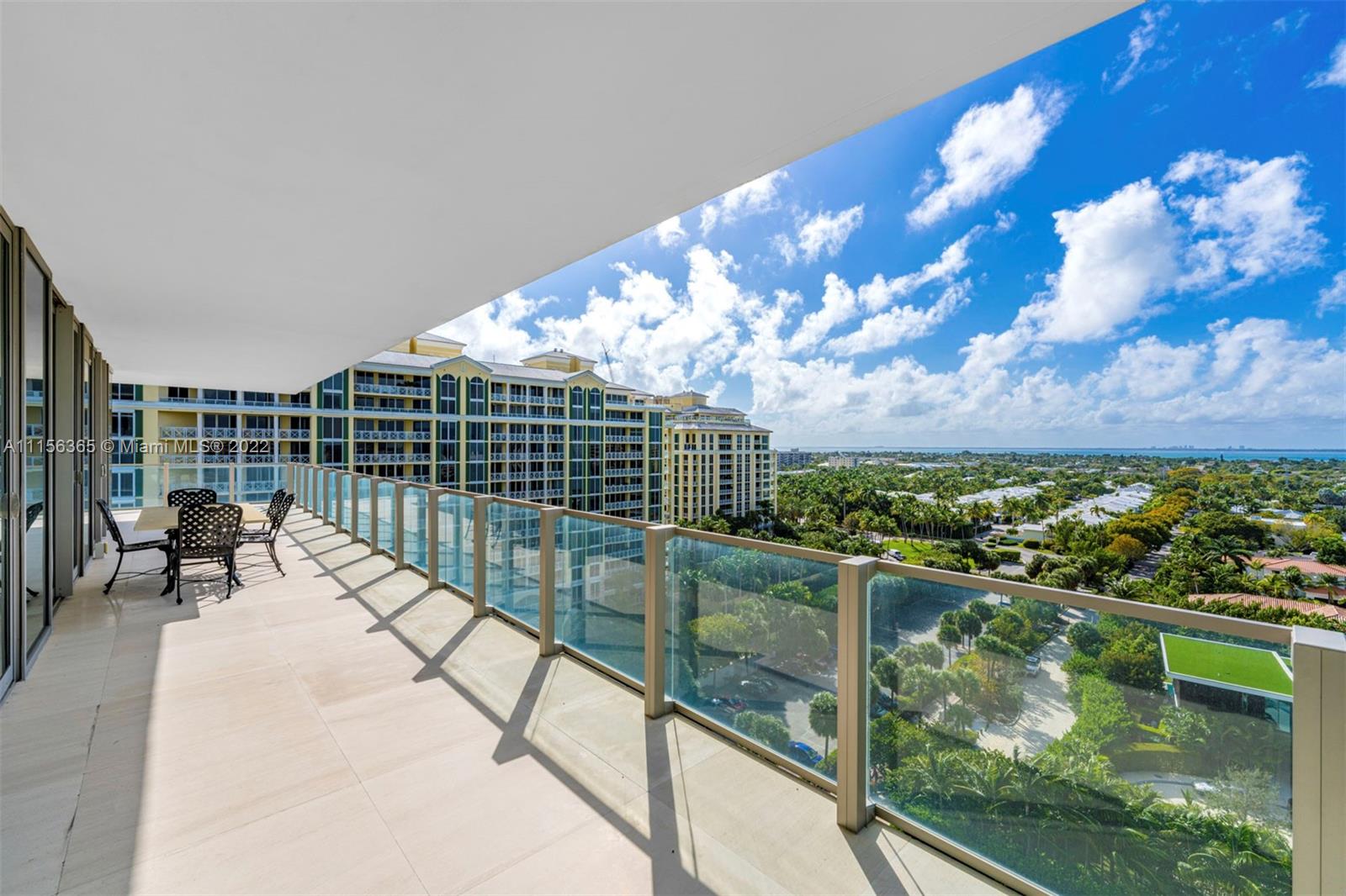 360 Ocean Drive, Unit 1101S Key Biscayne, FL 33149 - Photo 39 of 65 a view of a swimming pool with a patio