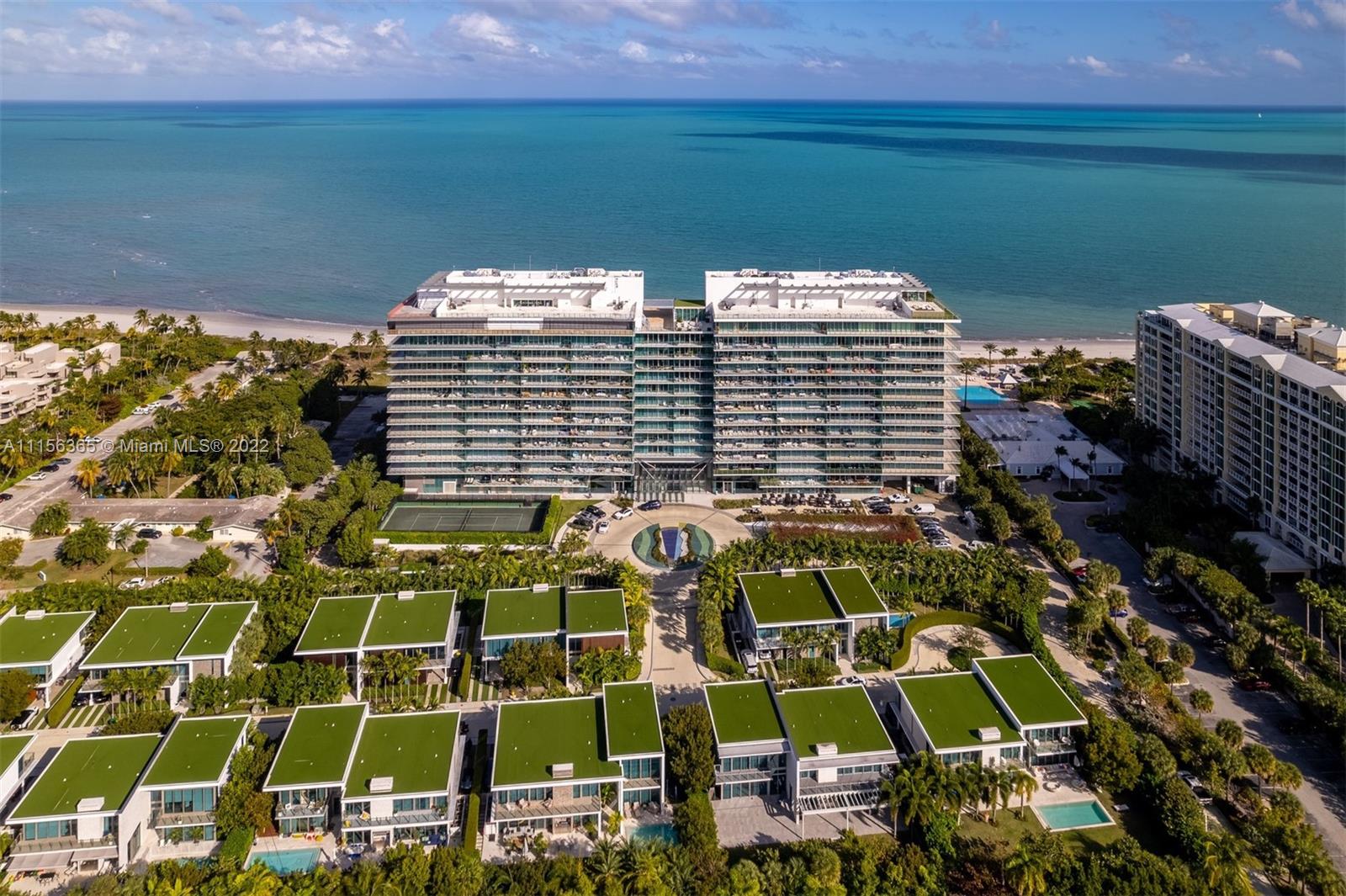 360 Ocean Drive, Unit 1101S Key Biscayne, FL 33149 - Photo 50 of 65 a view of building with an outdoor space