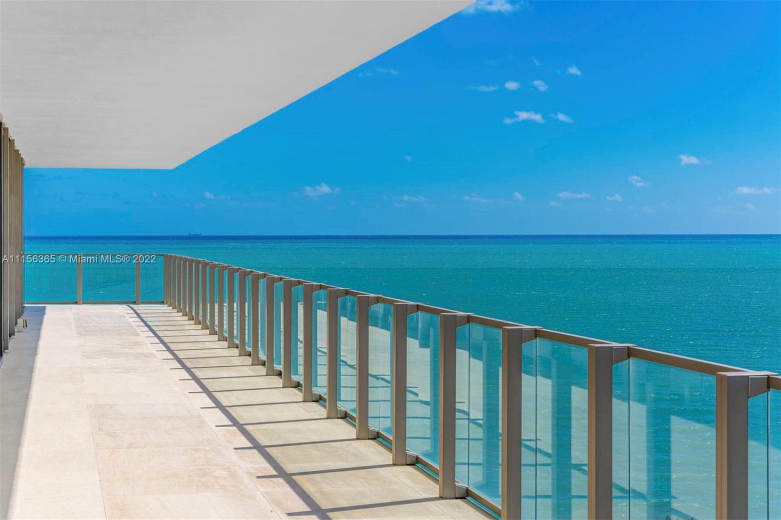 360 Ocean Drive, Unit 1101S Key Biscayne, FL 33149 - Photo 5 of 65 a view of balcony with wooden floor