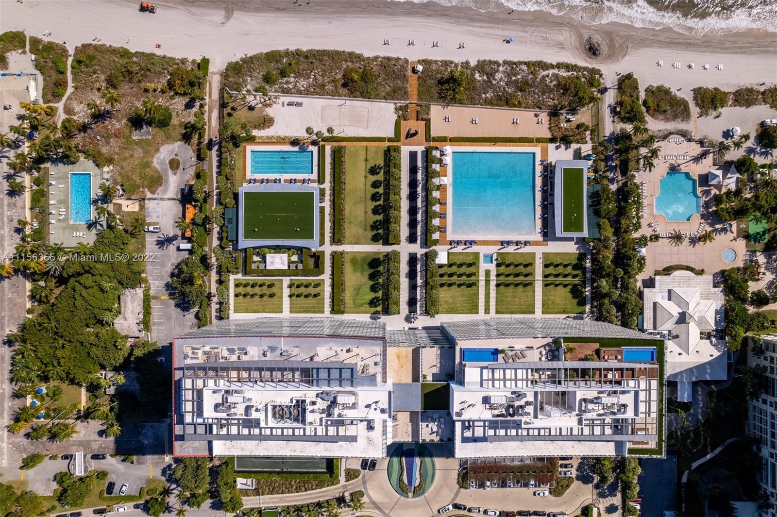 360 Ocean Drive, Unit 1101S Key Biscayne, FL 33149 - Photo 55 of 65 an aerial view of a building with parking
