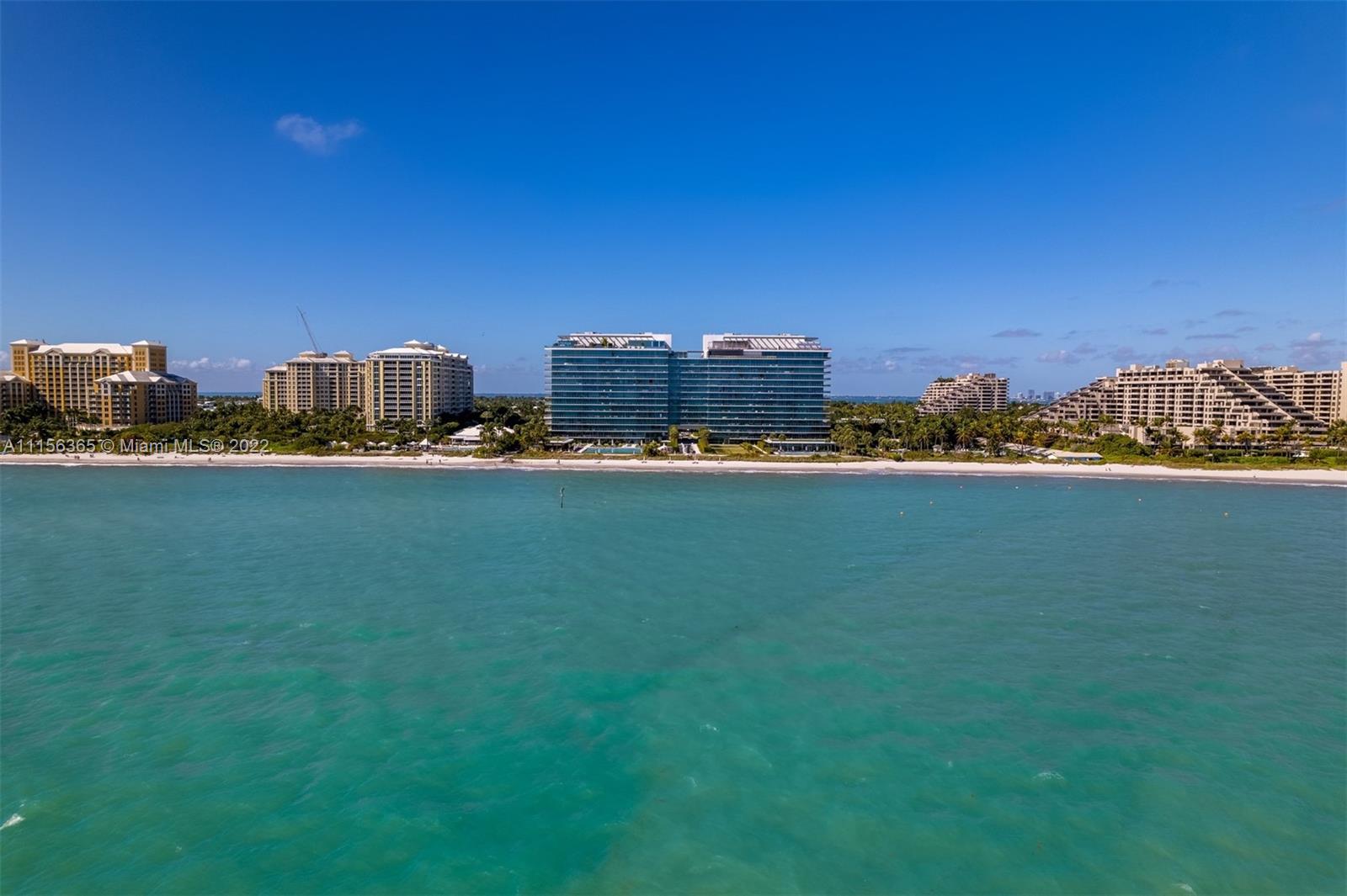 360 Ocean Drive, Unit 1101S Key Biscayne, FL 33149 - Photo 57 of 65 a view of a city with tall buildings and a big yard