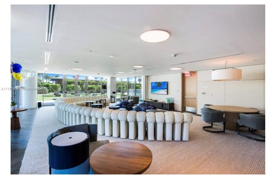 360 Ocean Drive, Unit 1101S Key Biscayne, FL 33149 - Photo 61 of 65 a living room with furniture and a large window