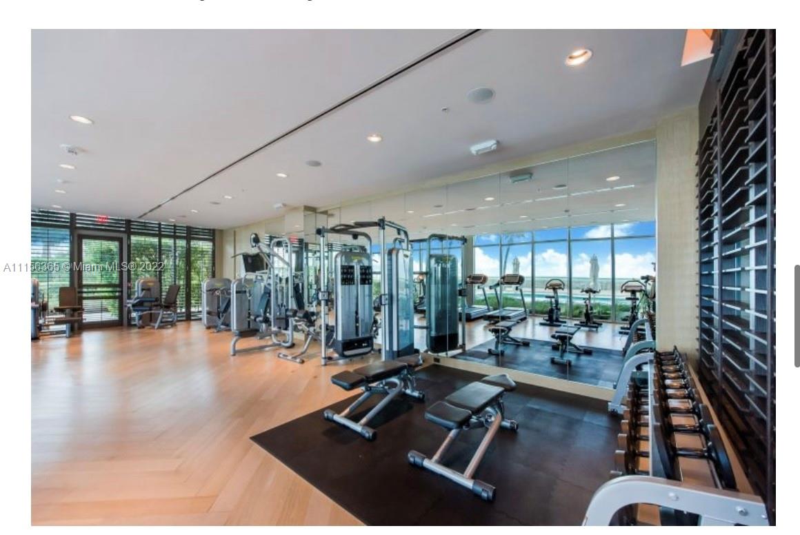 360 Ocean Drive, Unit 1101S Key Biscayne, FL 33149 - Photo 64 of 65 a view of a room with gym equipment