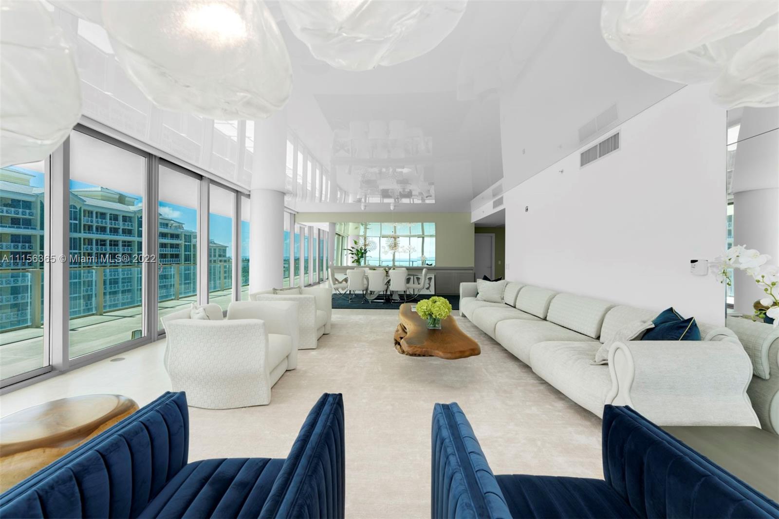 360 Ocean Drive, Unit 1101S Key Biscayne, FL 33149 - Photo 10 of 65 a living room with furniture and a large window