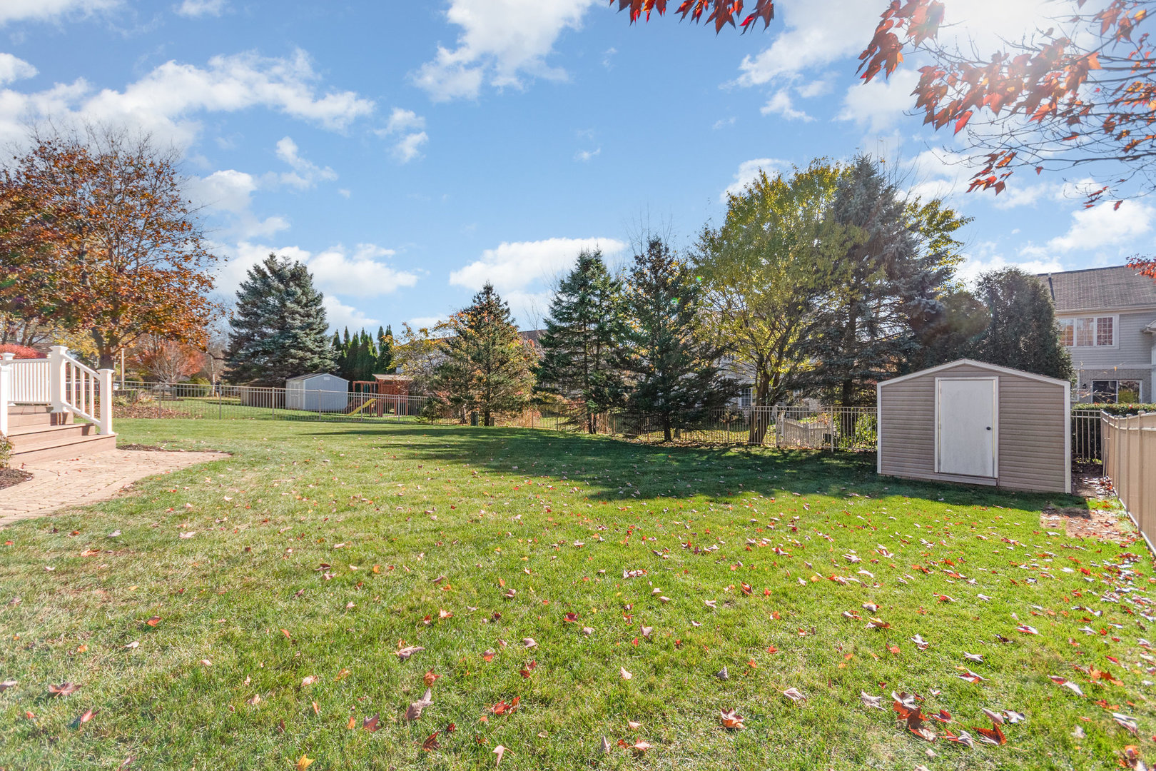 6076 Indian Trail Road Gurnee, IL 60031 - Photo 6 of 9 a view of a tree in front of a house