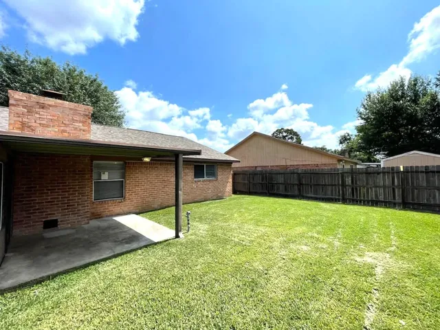 a house view with a garden space